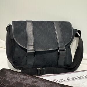 Authentic GUCCI black Guccisima canvas, leather Crossbody messenger bag wi COA